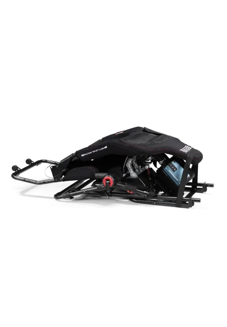 Next Level Racing Formula Lite Pro w pozycji złożonej wraz z dodatkowymi akcesoriami